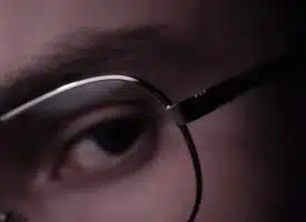 photo of person wearing eyeglasses