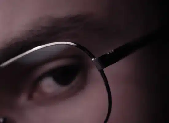 photo of person wearing eyeglasses